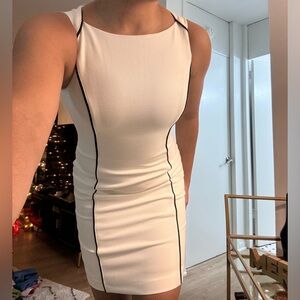 White House Black Market white dress with black lining. Size 4P